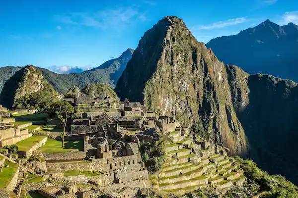 Landscape of Machu Picchu surrounded by the Andes mountains.